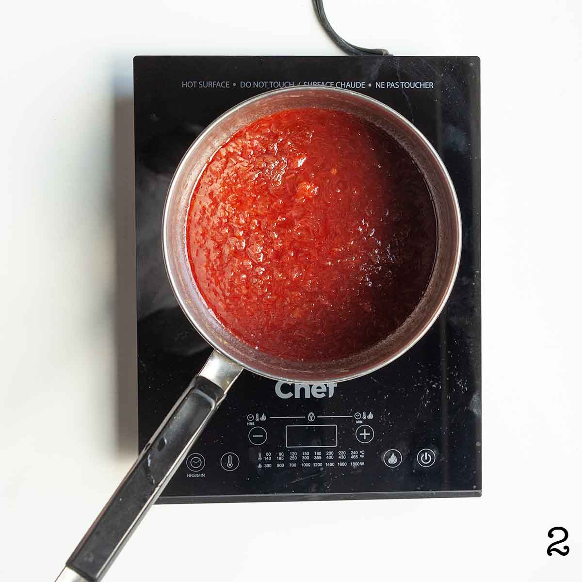 Jam cooking in a pot.