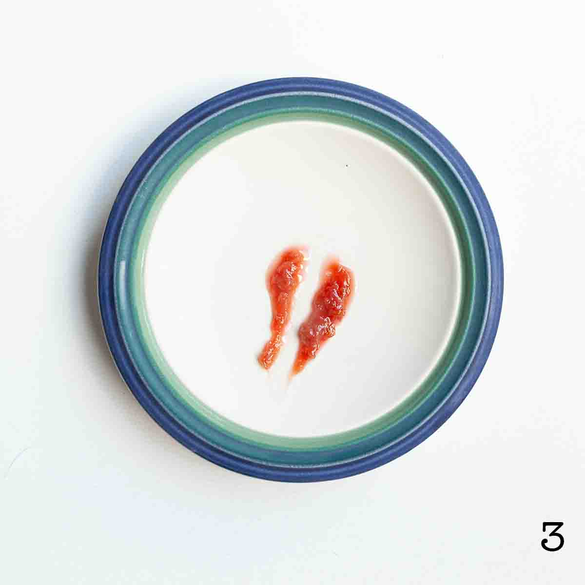 A plate with set jam on it.