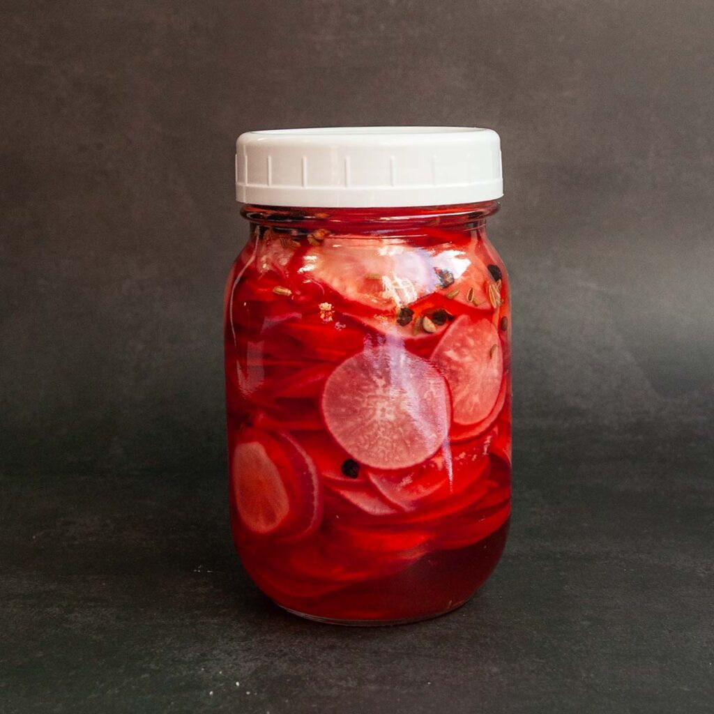 A jar of pickled radishes.