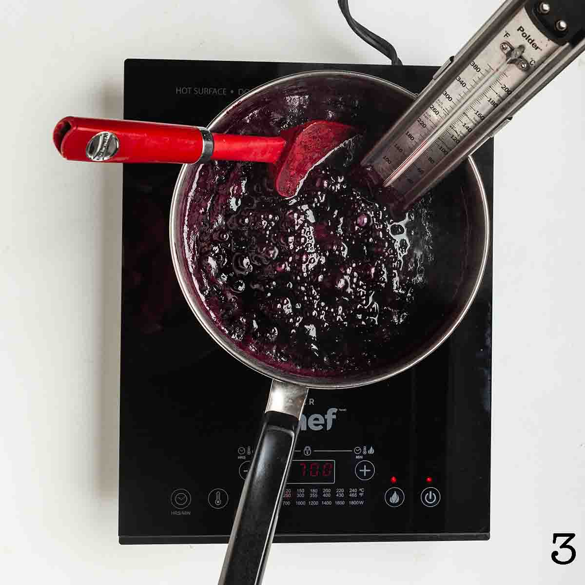 Jam cooking in a pot.