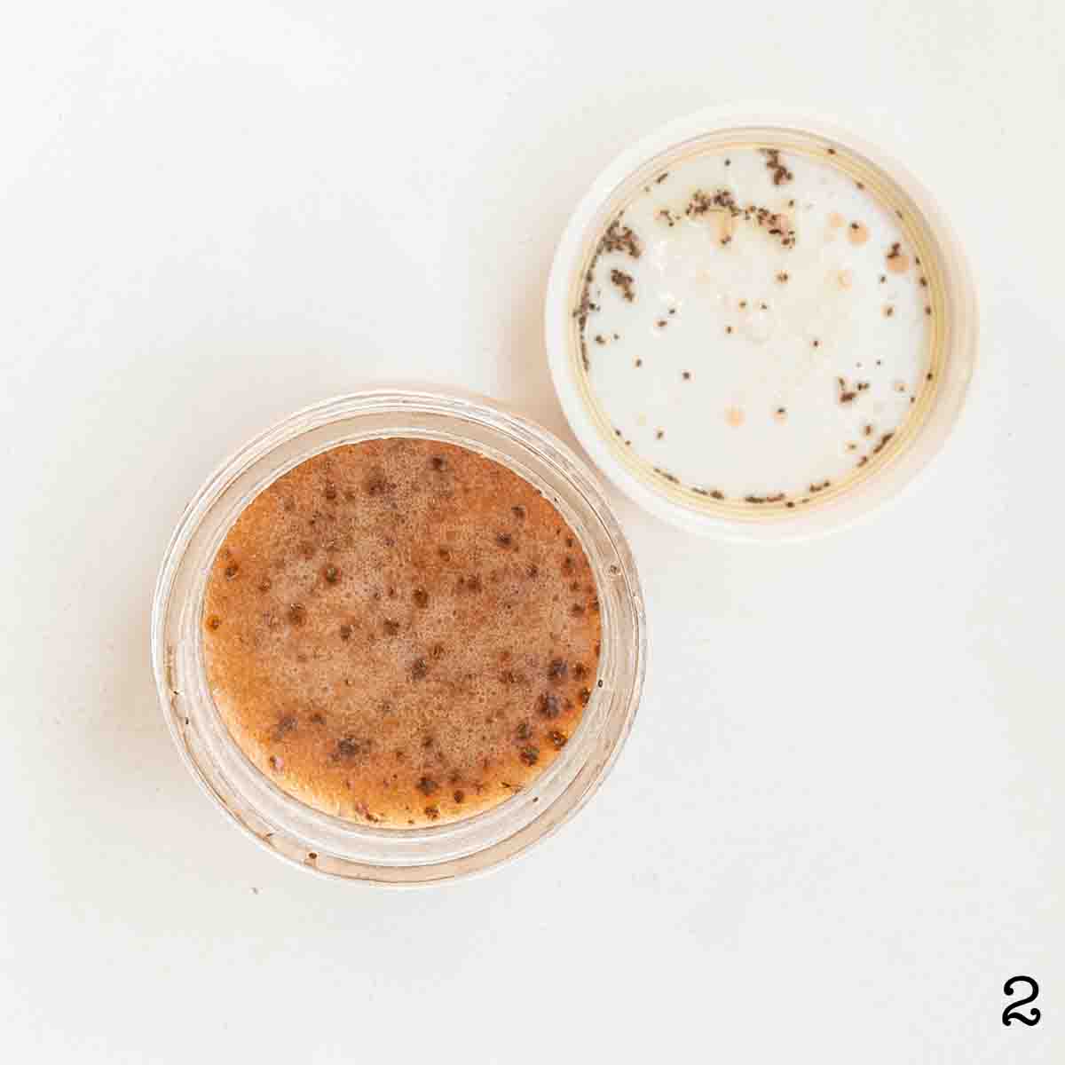 A small jar of salad dressing.