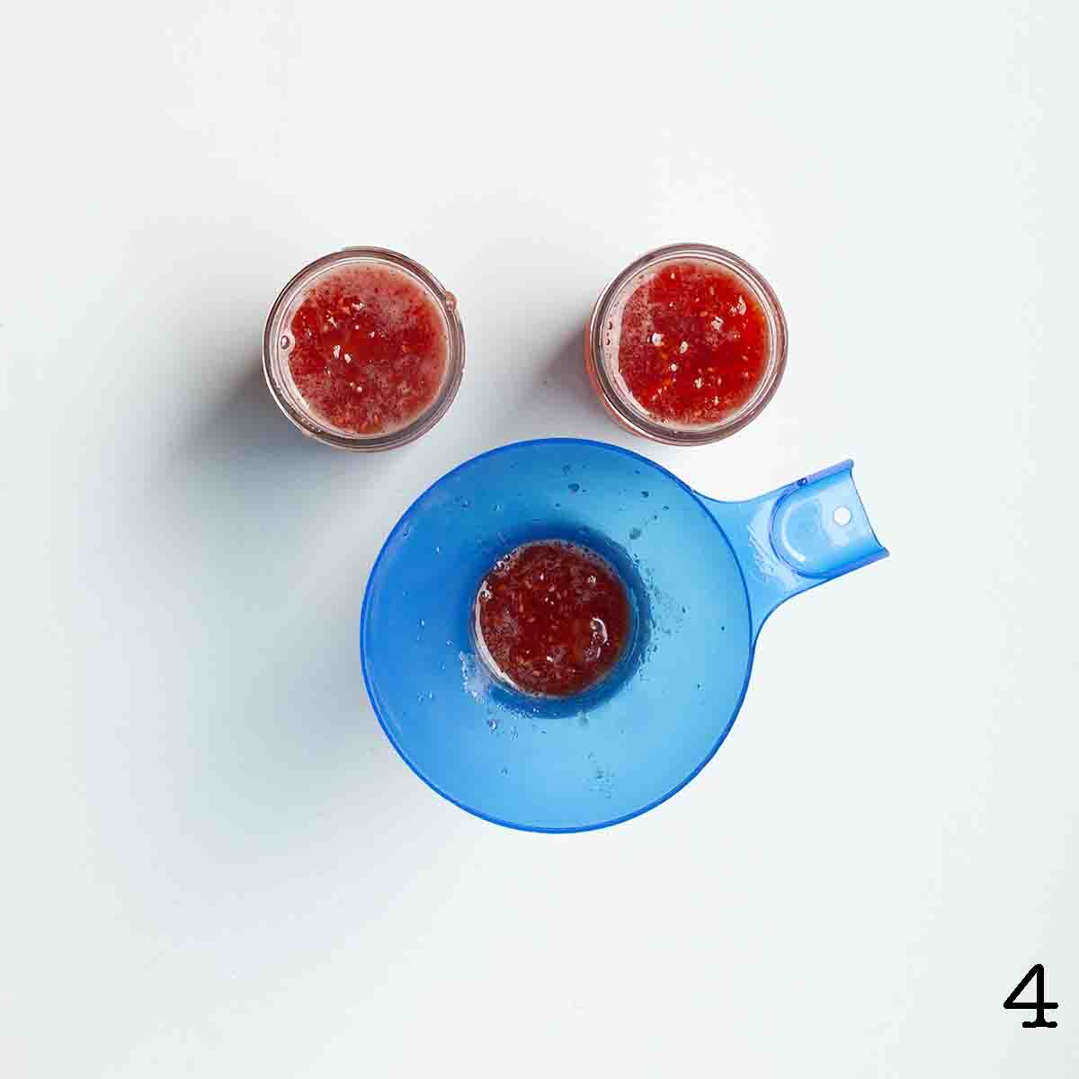 Peach raspberry jam divided between three jars.