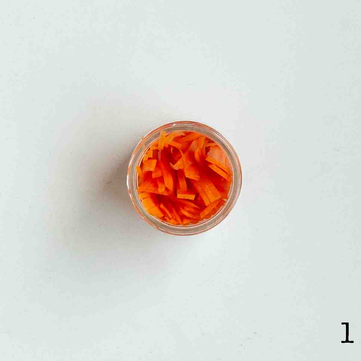 A jar of shredded carrots.