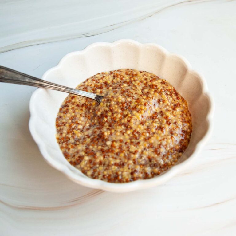 A dish of homemade whole grain mustard.